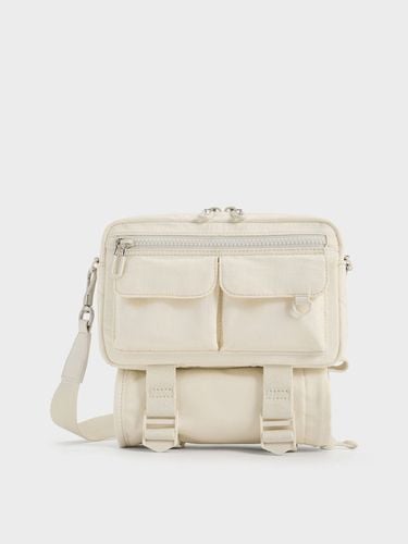 Charles & Keith - Soleil Nylon Multi-Pocket Crossbody Bag - Charles & Keith - Modalova