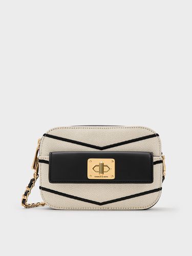 Charles & Keith - Eleni Canvas Chevron Zip Crossbody Bag - Charles & Keith - Modalova