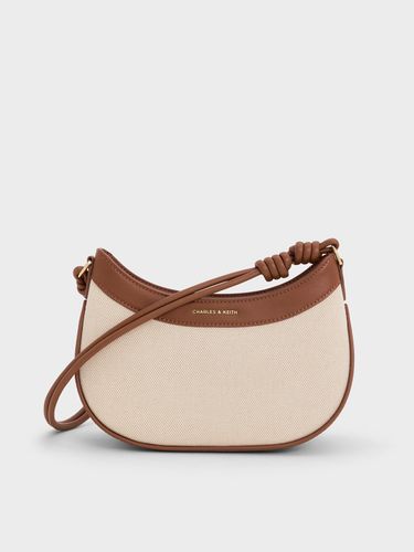 Charles & Keith - Sabine Canvas Knotted-Strap Curved Shoulder Bag - Charles & Keith - Modalova