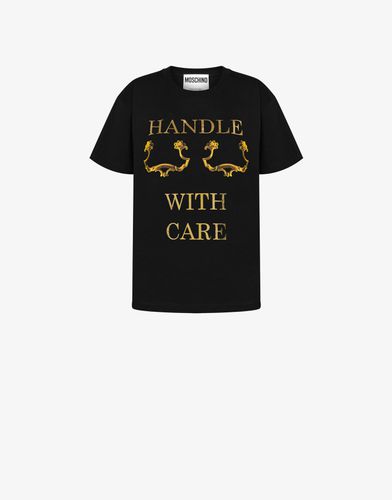 Camiseta Handle With Care - Moschino - Modalova