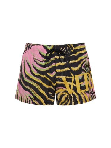 Logo Printed Nylon Swim Shorts - VERSACE - Modalova