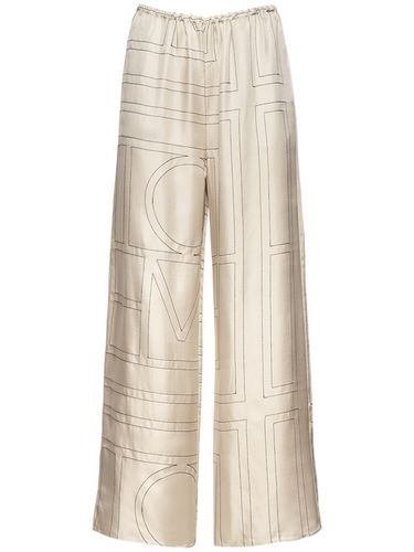 Monogram Embroidered Silk Pants - TOTEME - Modalova