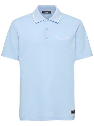 Polo In Cotone Piqué Con Logo - VERSACE - Modalova