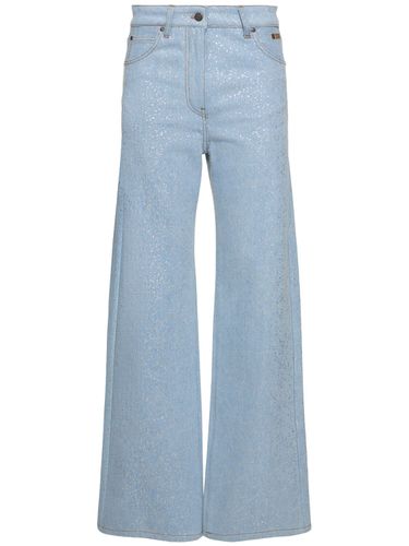 Jeans Larghi Vita Bassa In Denim Spalmato - MSGM - Modalova