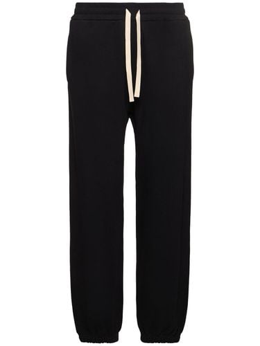 Compact Cotton Terry Sweatpants - JIL SANDER - Modalova