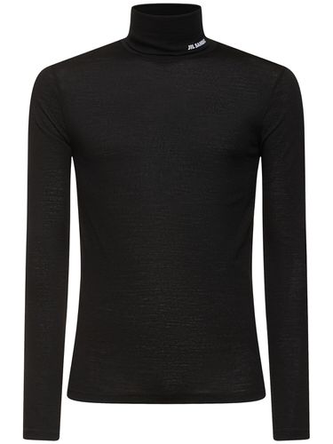 T-shirt Aus Wolljersey Mit Rollkragen - JIL SANDER - Modalova