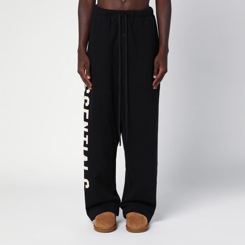 Pantalone jogging nero con logo - Fear of God Essentials - Modalova