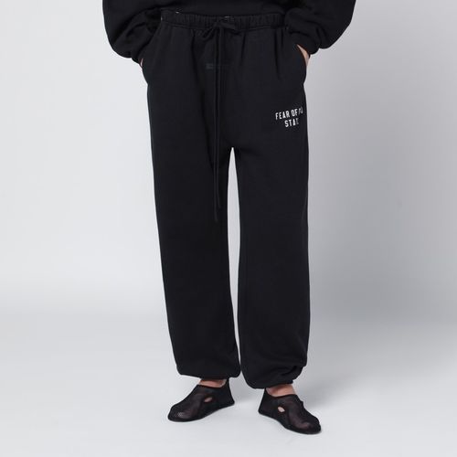 Black jogging trousers with logo - Fear of God Essentials - Modalova