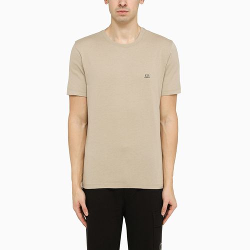 T-shirt beige con stampa logo sul petto - C.P. Company - Modalova