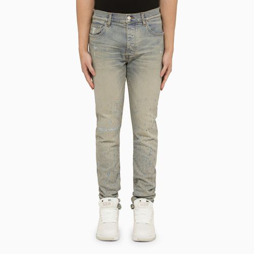 Jeans skinny distressed indigo antico - AMIRI - Modalova