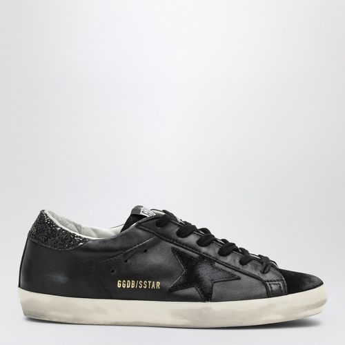 Super-star black low trainer with rhinestones - Golden Goose - Modalova