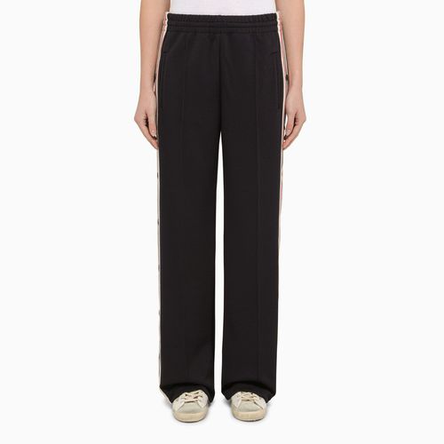 Dark sports trousers with side band - Golden Goose - Modalova