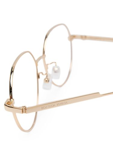 Gafas con montura redonda - Bottega Veneta Eyewear - Modalova