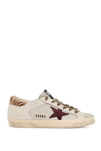 Super-star Canvas And Leather Sneakers - Golden Goose - Modalova