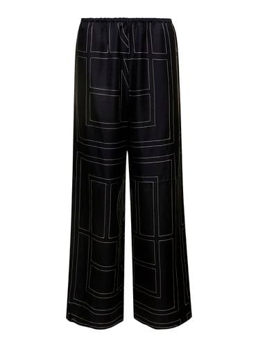 Loose Pants With Monogram Print In Silk Woman - Totême - Modalova