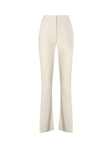 Tight-fitting Trousers With Slightly Flared Legs - Genny - Modalova