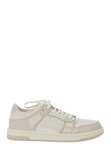 Skel Top Low Sneakers With Logo Patch On Thetongue And Contrasting Details On The Side In Leather Woman - AMIRI - Modalova