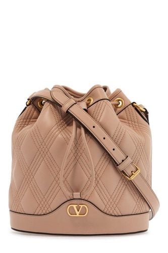 Vlogo Plaque Drawstring Quilted Shoulder Bag - Valentino Garavani - Modalova