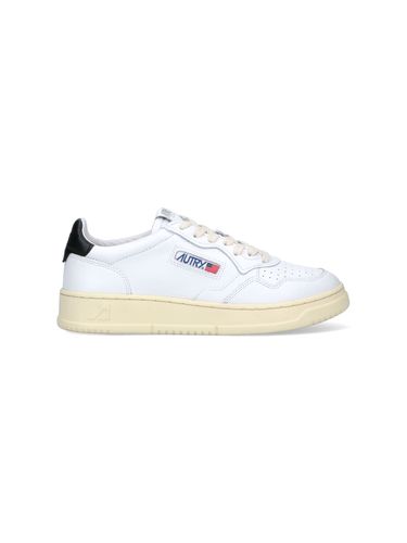 Medalist Low Sneakers In White And Black Leather - Autry - Modalova