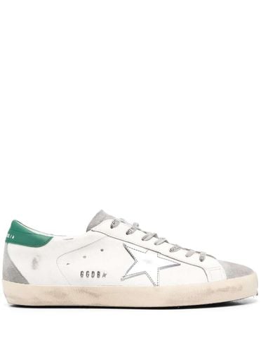 Super-star Low Top Sneakers With Embossed Logo And Contrasting Heel Tab In Leather And Suede Man - Golden Goose - Modalova