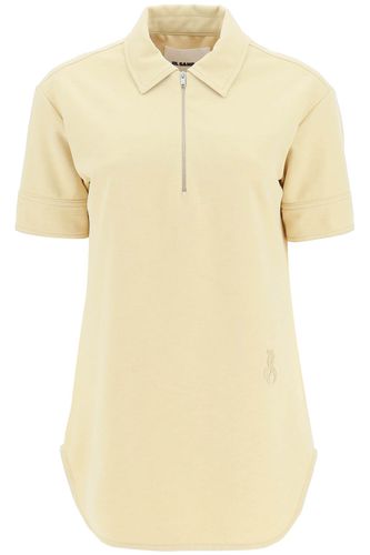 Polo Shirt With Half Zip And Monogram Embroidery - Jil Sander - Modalova