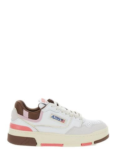 Low Top Sneakers With Logo Patch In Leather Woman - Autry - Modalova