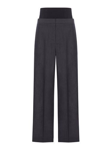 TAILORED TROUSERS WITH KNIT BAND - Woman - Alaia - Modalova