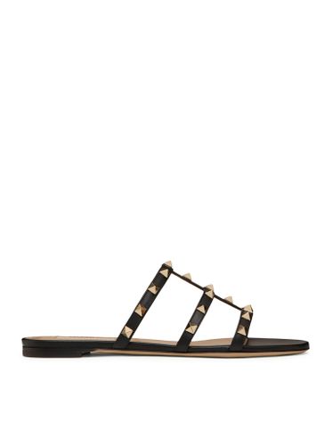 ROCKSTUD LOW SLIDER SANDAL IN CALFSKIN - Woman - Valentino Garavani - Modalova