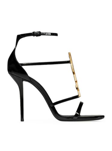 CASSANDRA SANDALS IN PAINTED LEATHER WITH GOLDEN MONOGRAM - Woman - Saint Laurent - Modalova