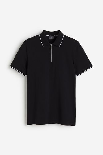 Poloshirt mit Zipper in Slim Fit Schwarz, Poloshirts Größe L. Farbe: - H&M - Modalova
