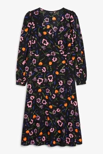 Langärmeliges Kleid, V-Ausschnitt, Schwarz Blumen-Konfetti-Print schwarz, Alltagskleider in Größe 38. Farbe: - Monki - Modalova