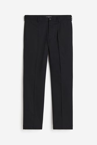 Hose mit Bügelfalten in Regular Fit Schwarz, Anzughosen Größe W 32. Farbe: - H&M - Modalova