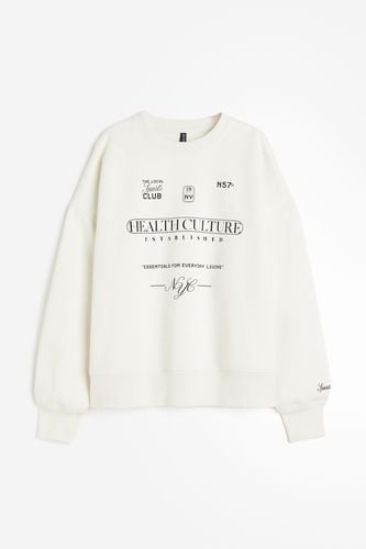 Oversized Sweatshirt mit Motiv Cremefarben/Health Culture, Tops in Größe XXS. Farbe: - H&M - Modalova