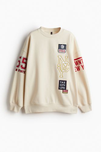 Oversized Sweatshirt mit Print Hellbeige/NYC, Sweatshirts in Größe XXS. Farbe: - H&M - Modalova