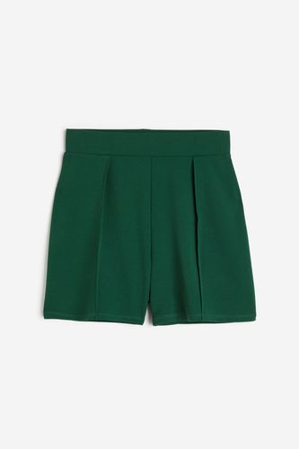 Shorts mit Bundfalten Dunkelgrün in Größe XS. Farbe: - H&M - Modalova