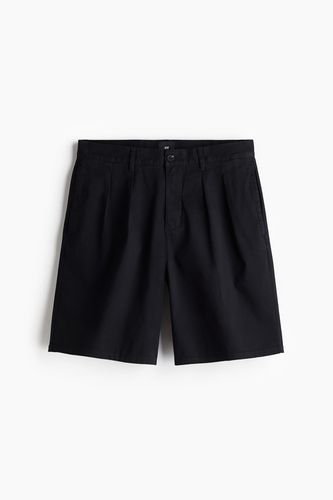 Chino-Shorts in Loose Fit Schwarz Größe W 34. Farbe: - H&M - Modalova