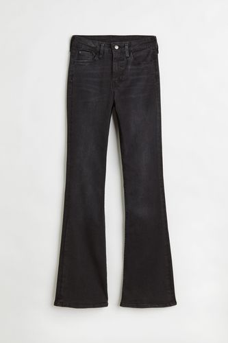 Flared Ultra High Jeans Schwarz, Straight in Größe 40. Farbe: - H&M - Modalova