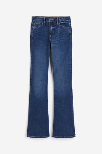 Flared Ultra High Jeans Dunkles Denimblau, Straight in Größe 40. Farbe: - H&M - Modalova