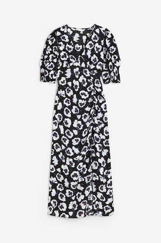 Crêpe-Kleid mit Puffärmeln Schwarz/Geblümt, Alltagskleider in Größe S. Farbe: - H&M - Modalova
