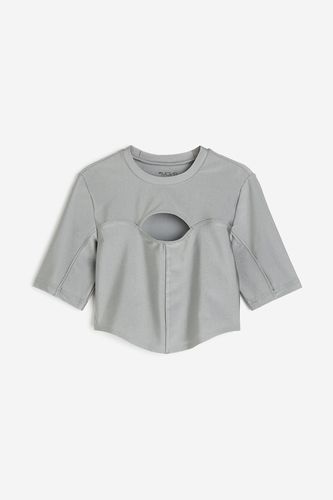 DryMove™ Kurzes Sportshirt mit Cut-out Silberfarben, Sport – T-Shirts in Größe XXL. Farbe: - H&M - Modalova