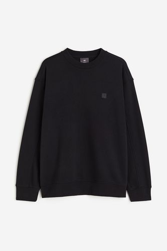 Sweatshirt mit Applikation Relaxed Fit Schwarz, Sweatshirts in Größe L. Farbe: - H&M - Modalova