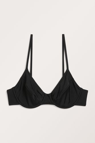 Schwarzer Bikini-BH mit Bügeln Schwarz, Bikini-Oberteil in Größe 85C. Farbe: - Monki - Modalova