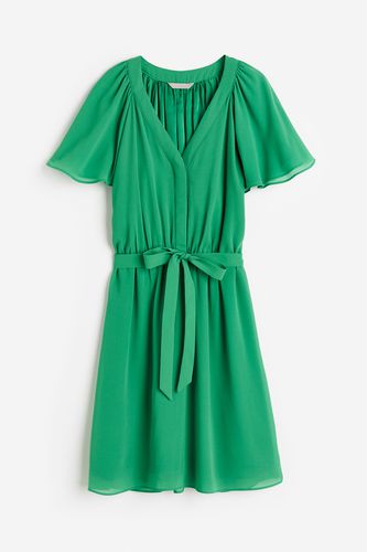 Chiffonkleid mit V-Ausschnitt Grün, Alltagskleider in Größe XS. Farbe: - H&M - Modalova
