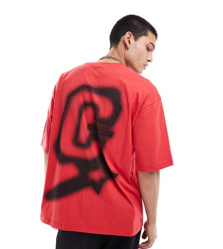 T-shirt skater comoda rossa con iniziale del logo - Collusion - Modalova