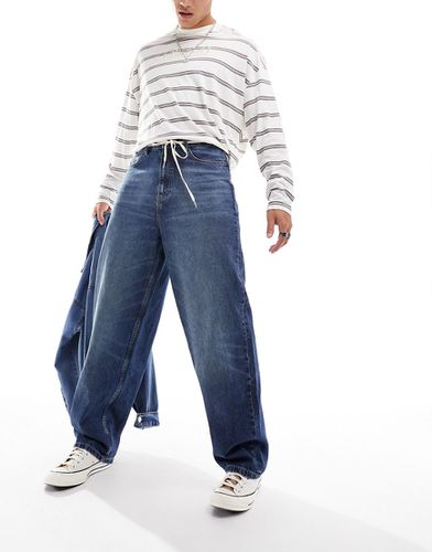 X014 - Jeans antifit a vita medio alta lavaggio medio - Collusion - Modalova