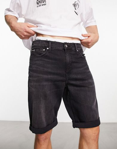 CC - Pantaloncini di jeans slim lavaggio nero medio - Calvin Klein Jeans - Modalova