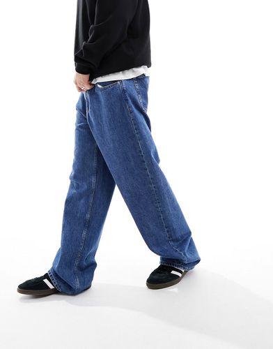 Jeans ampi anni '90 lavaggio medio - Calvin Klein Jeans - Modalova