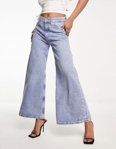 Jeans extra larghi con fondo ampio e a vita bassa lavaggio medio - Calvin Klein Jeans - Modalova