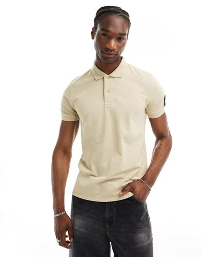 Polo beige con toppa - Calvin Klein Jeans - Modalova