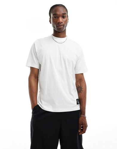 T-shirt oversize bianca con toppa - Calvin Klein Jeans - Modalova